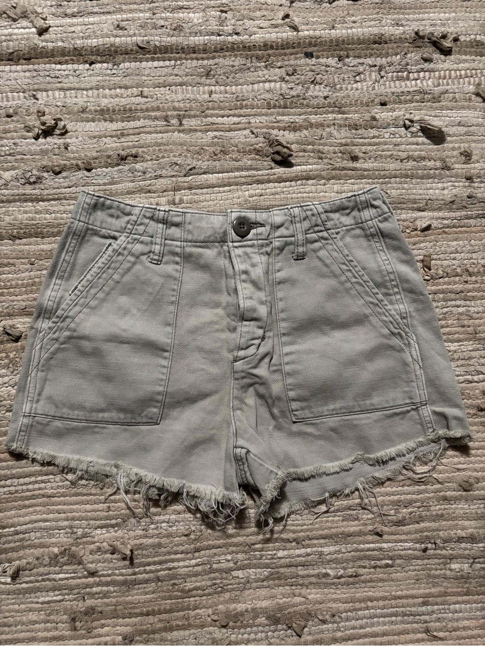 American Eagle Outfitters light green frayed hem shorts